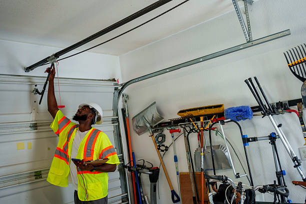 Professional Garage Door Panel Replacement technician working in Leominster, MA
